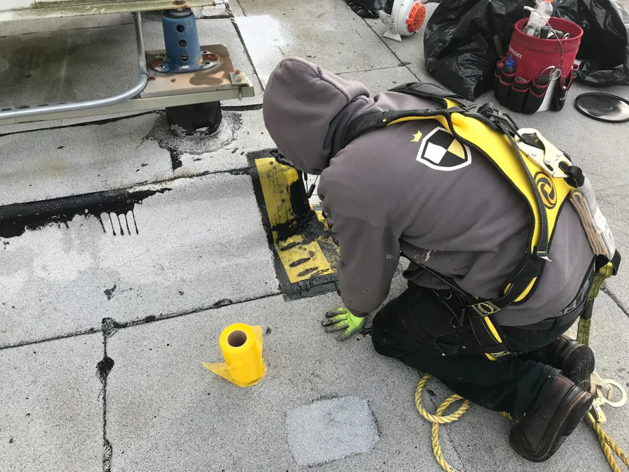 James King roofing technician carrying out roof repair work